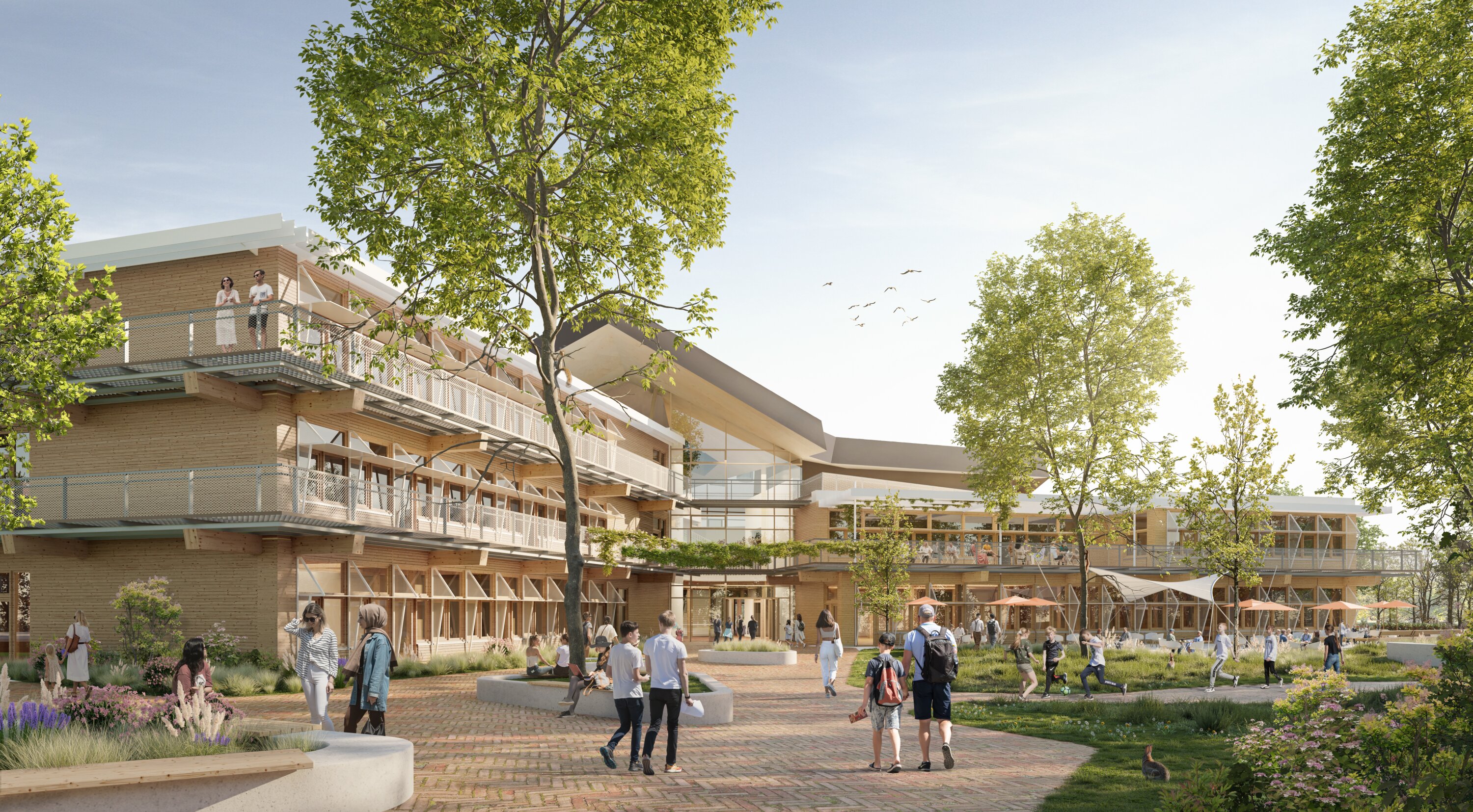 Project by Behnisch Architekturbuero, Hilde Domin School. Single-story modern house with wood and glass facade, set behind trees in a field of tall grass under a cloudy sky.
